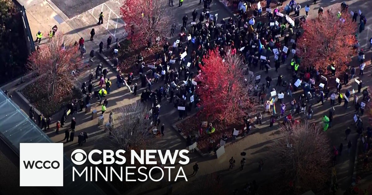 Protesters speak out amid Secretary Noem's visit to Minneapolis