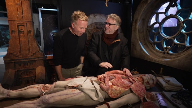 guillermo-del-toro-with-his-model-of-the-creature.jpg