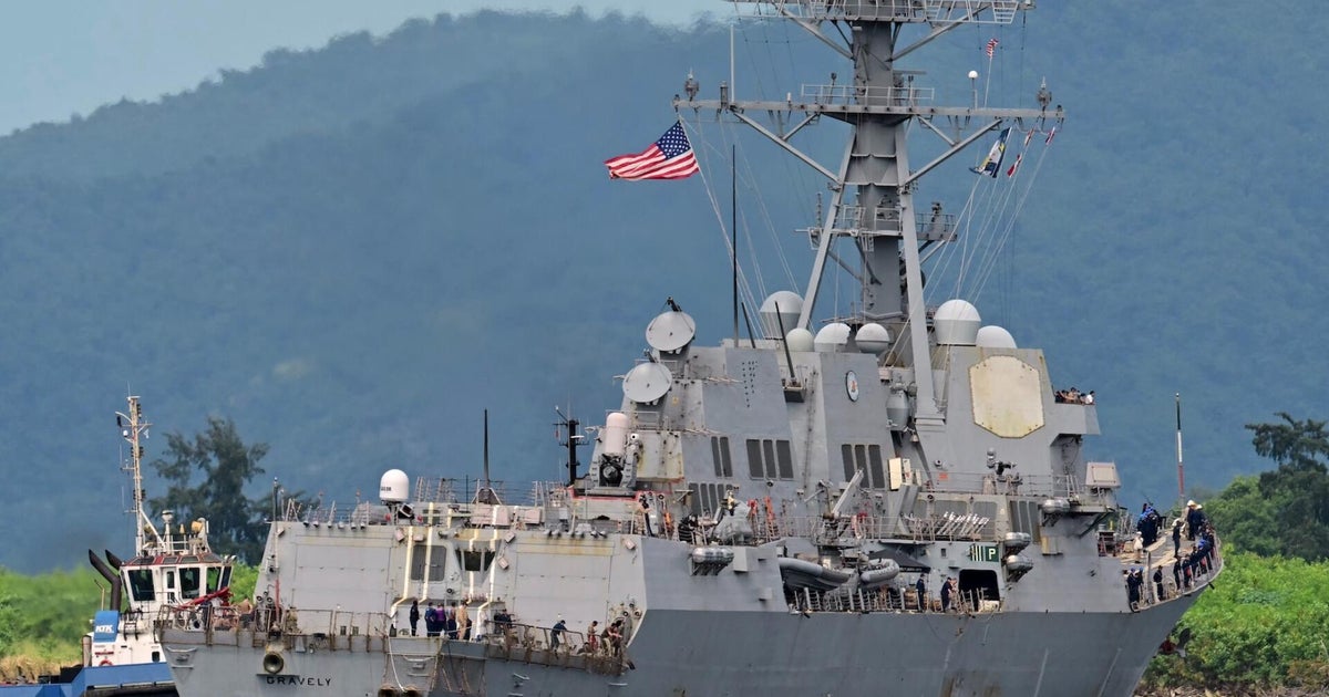 Trump administration alludes to Venezuelan land strikes as it docks warship in Trinidad and Tobago