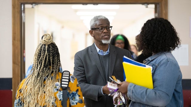 William Penn School District Superintendent Eric Becoats speaks with people during a teachers job fair