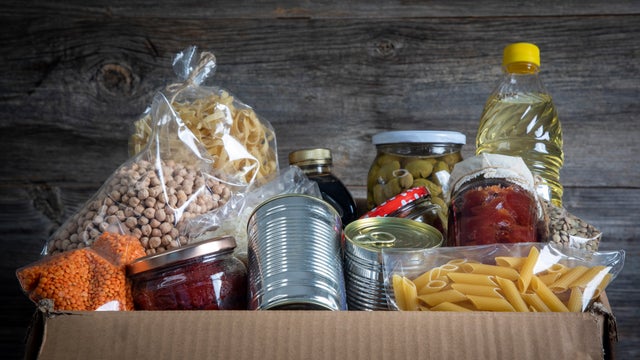 Volunteer with box of food for poor . Ramazan kolisi . Donation concept