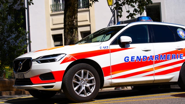 Car of cantonal police unit at the old town of Nyon. 