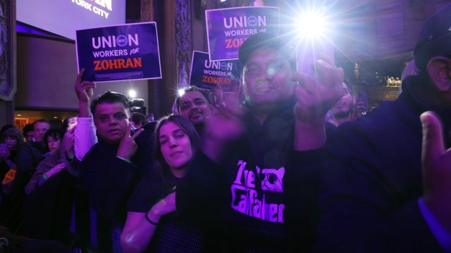 People cheer as New York City Democratic mayoral candidate Zohran Mamdani takes the stage at his election night watch party at the Brooklyn Paramount on November 4, 2025 in the Brooklyn borough of New York City. 