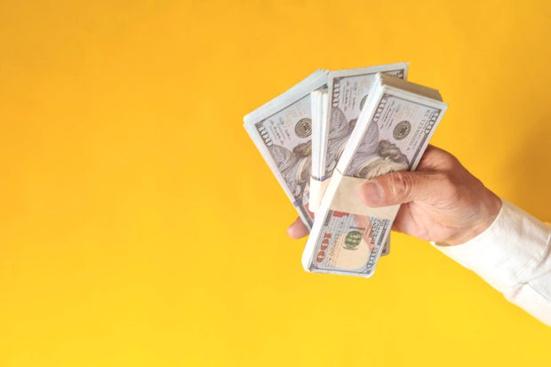 Money in the hands, The concept of holding dollars