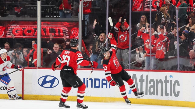 Jesper Bratt #63 of the New Jersey Devils celebrates with Timo Meier #28 of the New Jersey Devils after scoring a goal during a game between the Montréal Canadiens and New Jersey Devils at Prudential Center on November 6, 2025 in Newark, New Jersey. 