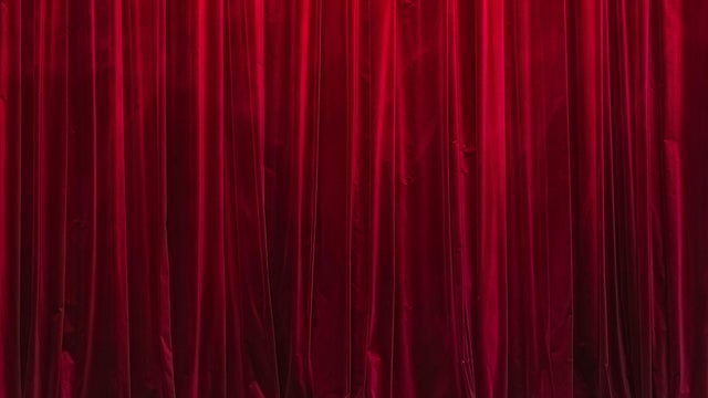 Closed red theatre curtains 