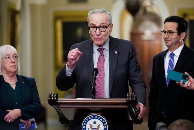 Senate Minority Leader Chuck Schumer, flanked by Sens. Patty Murray and Brian Schatz, speaks to reporters on Nov. 4, 2025, at the Capitol. 