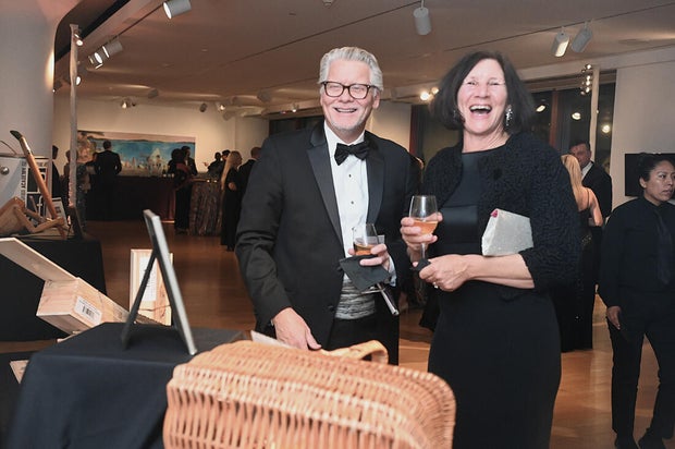 People pose for a photo at the 27th Annual Bacchanal Wine Gala and Auction 