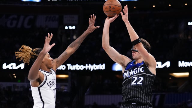 Franz Wagner #22 of the Orlando Magic goes up for a shot against Noah Clowney #21 of the Brooklyn Nets during the third quarter of the NBA Cup game at Kia Center on November 14, 2025 in Orlando, Florida. 
