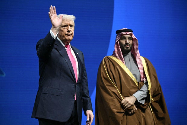 Crown Prince Mohammed bin Salman of Saudi Arabia and President Trump wave as they leave the U.S.-Saudi Investment Forum at the John F. Kennedy Center for the Performing Arts in Washington, D.C., on Nov. 19, 2025. 
