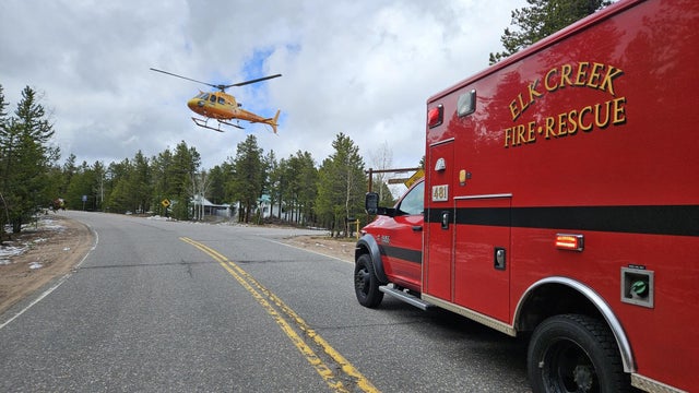 flight-for-life-helicopter-landing-on-the-road-in-front-of-an-elk-creek-fire-ambulance.jpg 