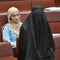 Australian senator banned for wearing burqa in protest blasted as racist