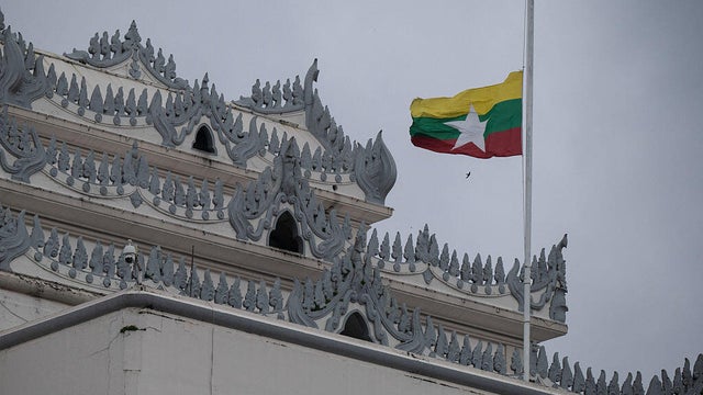 Myanmar's national flag flies at half-staff outside City Hall in Yangon on July 19, 2025, during the 78th Martyrs' Day. 
