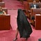 Far-right Australian senator draws ire by donning a burqa in parliament