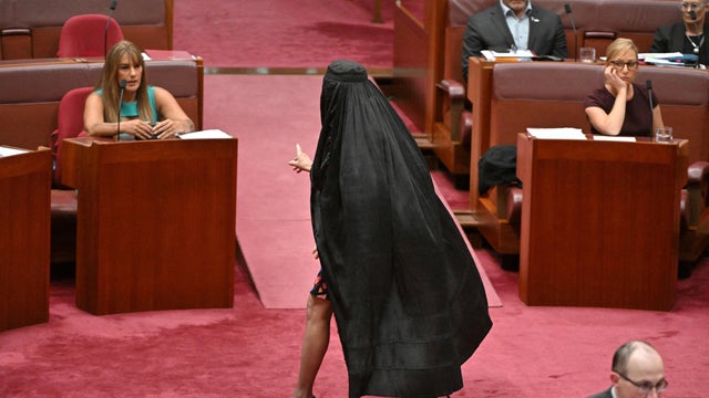 Australian far-right senator wears burqa to parliament, sparking outrage 