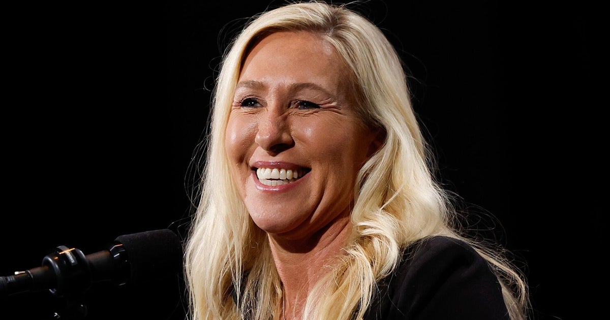 Why is Marjorie Taylor Greene resigning from Congress?