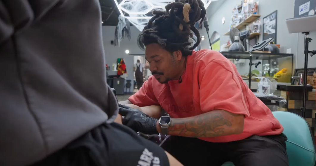 Atlanta tattoo artist inks 6-year-old's design on himself after boy wins shop contest
