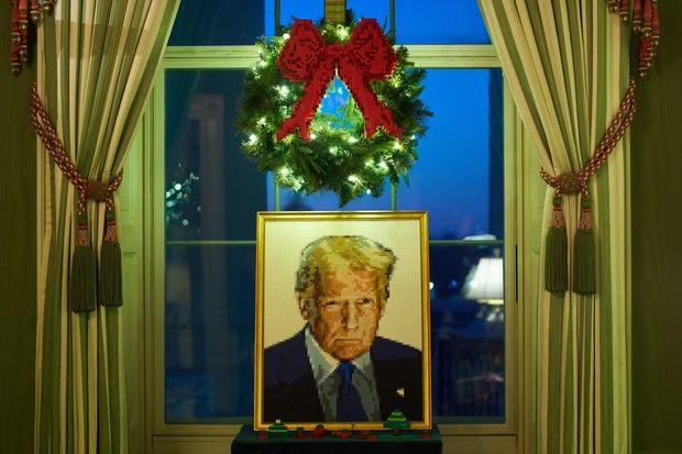 A Lego portrait of President Trump decorates the Green Room of the White House as part of this year's Christmas decorations.