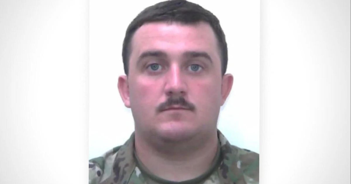 National Guardsman injured in shooting has woken up from induced coma, West Virginia governor says