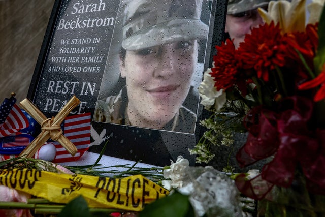 A makeshift memorial honors slain West Virginia National Guard member Sarah Beckstrom, who was shot with fellow guard member Andrew Wolfe outside a subway station near the White House, in Washington, D.C., Dec. 2, 2025.
