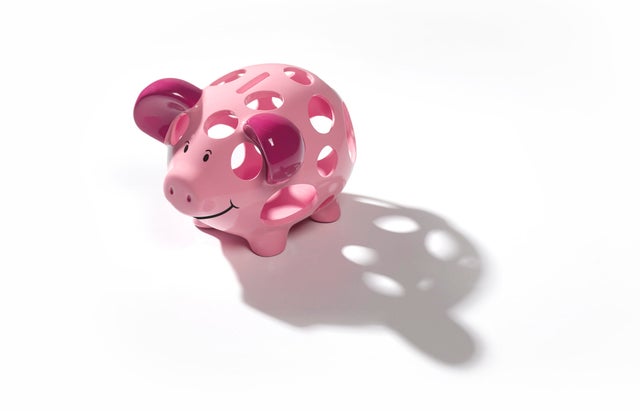 Holey piggy bank with copy space