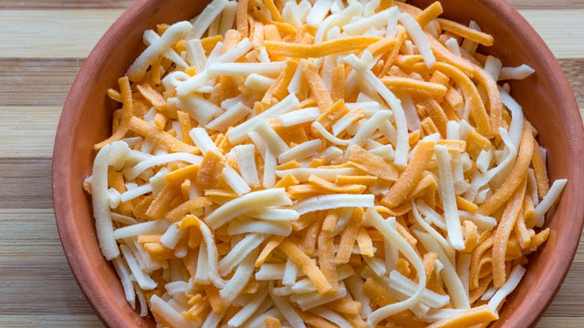 Mixture of cheddar and mozzarella cheese. Healthy eating 