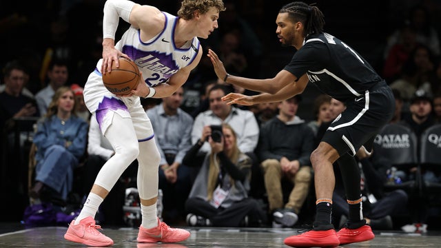 Lauri Markkanen #23 of the Utah Jazz in action against Ziaire Williams #1 of the Brooklyn Nets during their game at Barclays Center on December 04, 2025 in New York City. 