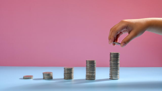 Money coins arranged as a graph 