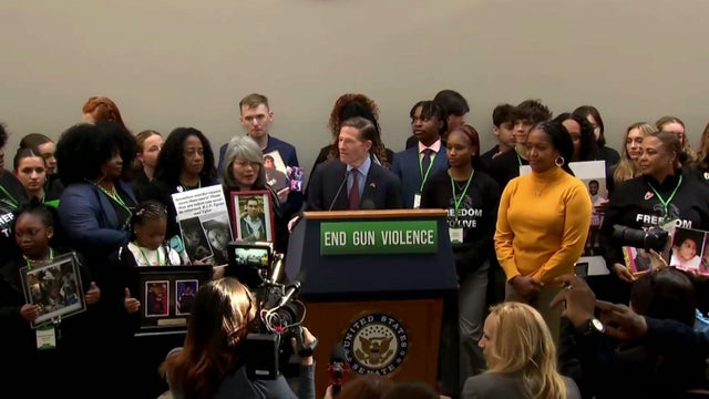 Sen. Richard Blumenthal and others at a podium 