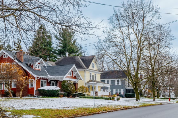Row of Single Family Homes on Residential Street in Western New York During Early Winter