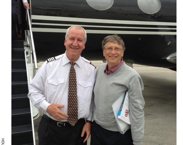 Bill Gates and an unidentified pilot in a photo provided to Congress by the Epstein estate.