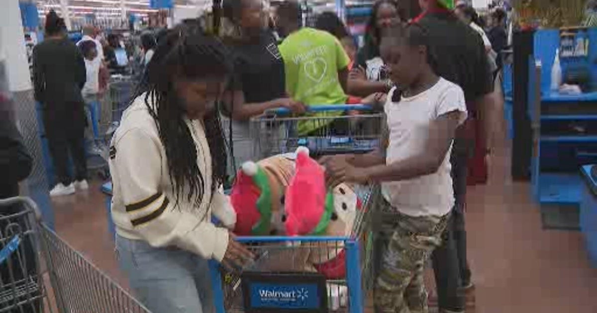 100 Black Men of South Florida help hundreds of children with their wish lists during annual Christmas shopping spree
