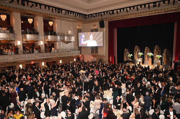 People pose for photos at the 2025 Pennsylvania Society Dinner