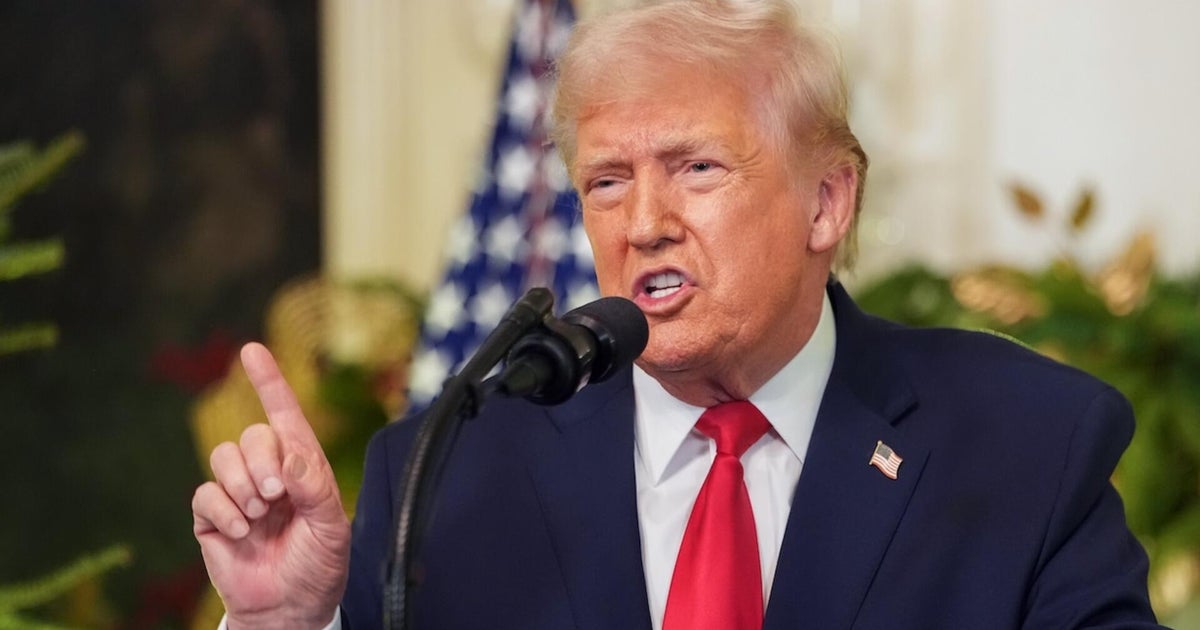 Trump defends economic policies and claims he's bringing the U.S. back from the "brink of ruin"