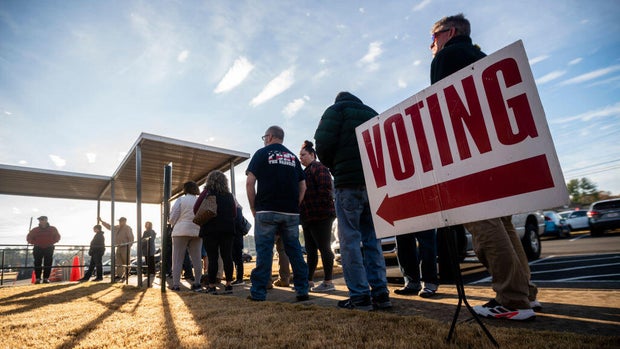 CARTERSVILLE, GA - NOVEMBER 26- People are seen in line to vot