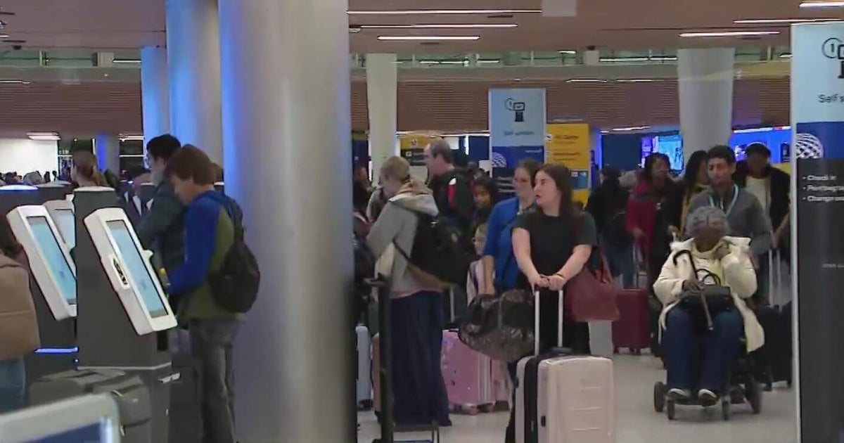 Holiday travel picks up at Denver International Airport with Tuesday as one of the busiest days