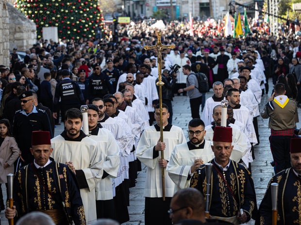 Christmas procession outside the Church of the Nativity in Bethlehem