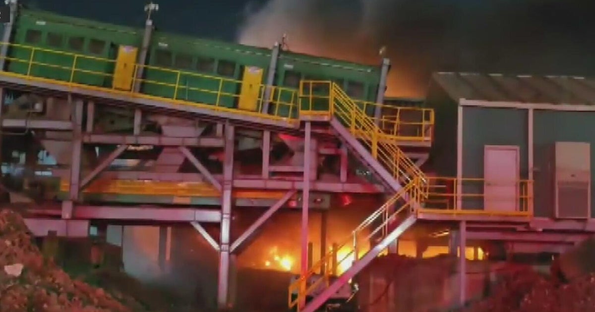 Fire crews douse large debris blaze near NW 135th Street