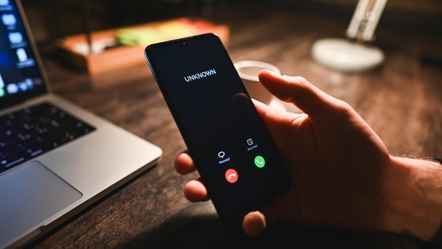 close up of unknown incoming call on mobile phone. 