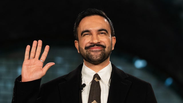 Mayor-elect Zohran Mamdani speaks before helping distribute 