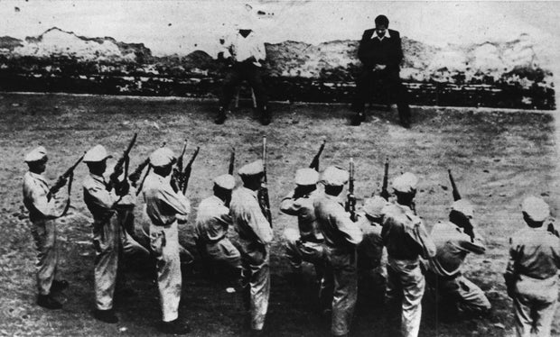 Two communists being shot 