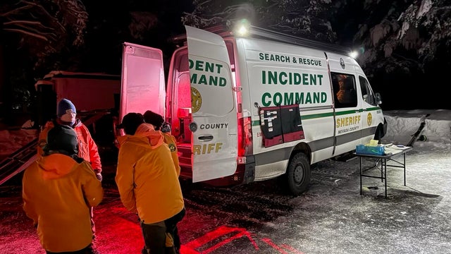 Close-up of flashing red emergency light at night 