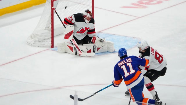 New York Islanders Left Wing Anthony Duclair (11) scores a goal on New Jersey Devils Goalie Jacob Markstrom (25) during the first period of the National Hockey League game between the New Jersey Devils and the New York Islanders on January 6, 2026, at UBS Arena in Elmont, NY. 