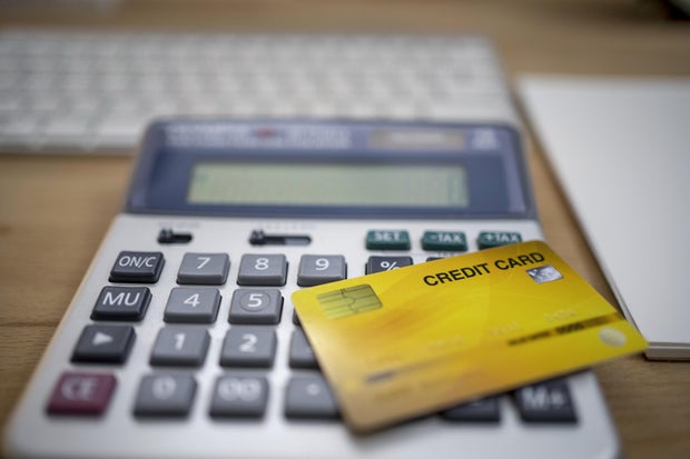 Credit card and calculator.Shopping online concept. 