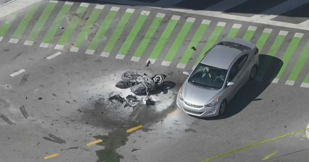 Two hospitalized after car-motorcycle crash on South Dixie Highway