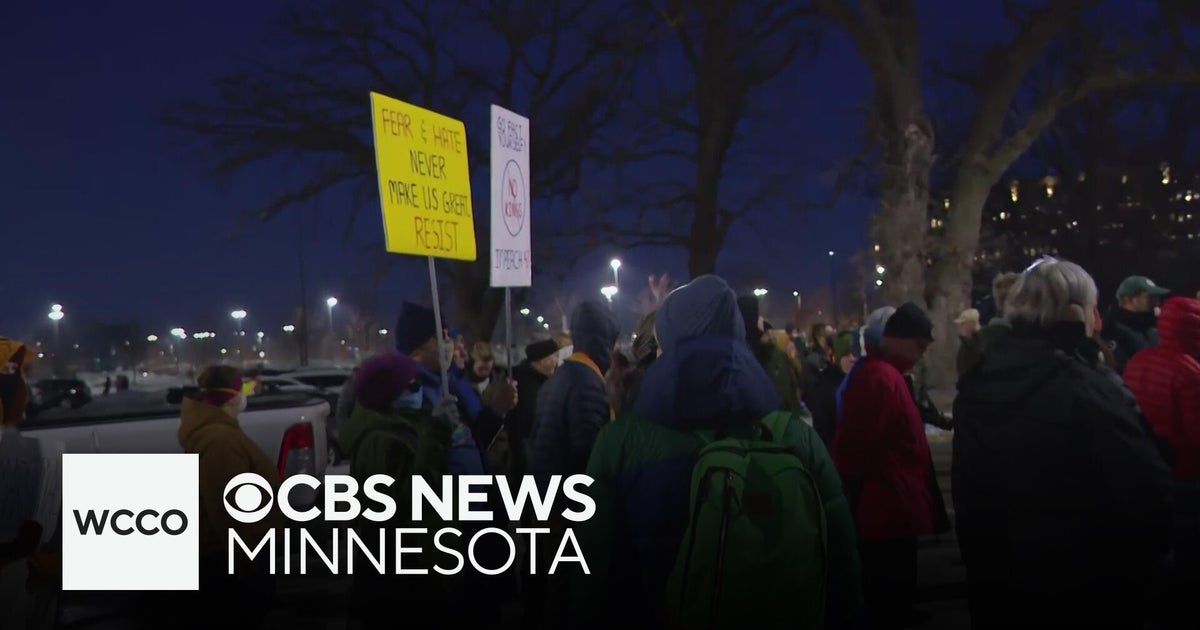 Protesters march in Minneapolis 1 day after deadly ICE shooting - CBS ...