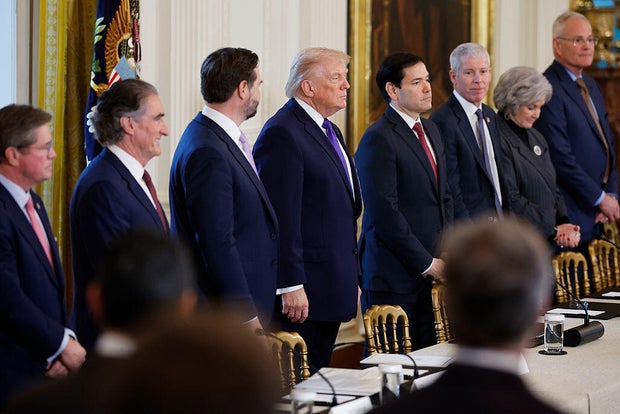 President Trump arrives for a meeting with oil and gas executives in the East Room of the White House in Washington, D.C., on Jan. 9, 2026, as Interior Secretary Doug Burgum, Vice President JD Vance and Secretary of State Marco Rubio look on. 