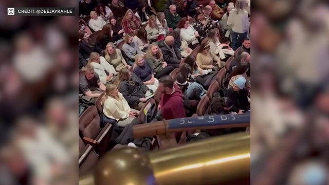 The audience at "Mamma Mia!" on Broadway 