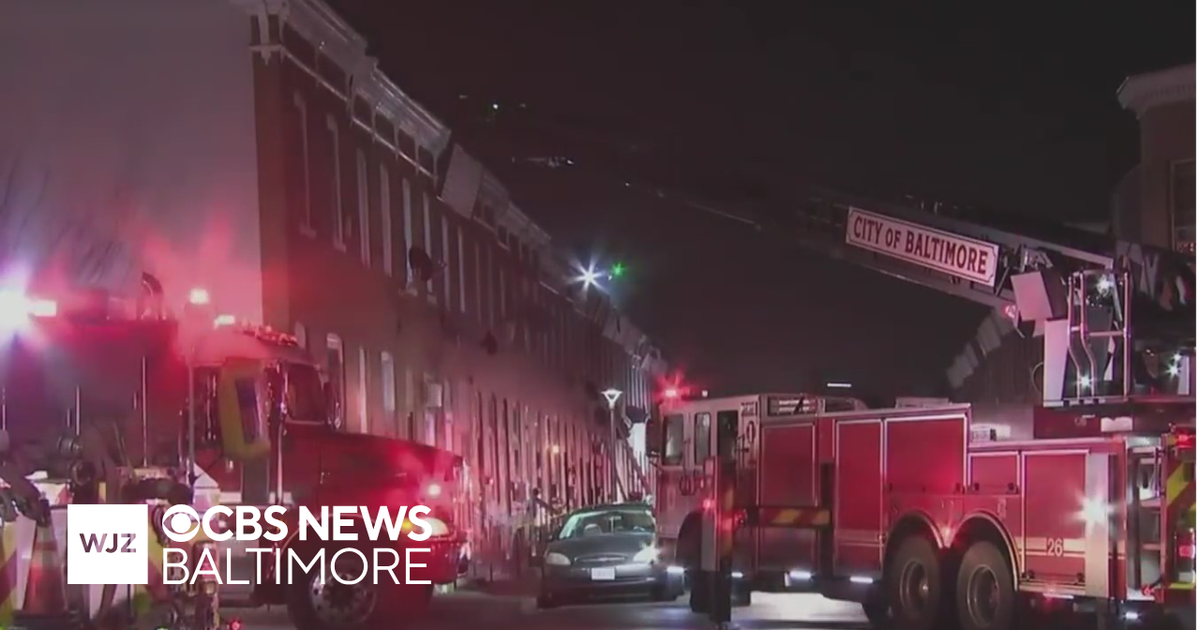 Two hospitalized, 1 displaced in East Baltimore row home fire - CBS ...