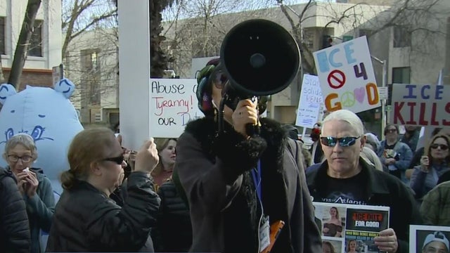 a crowd of people at a protest in Sacramento 